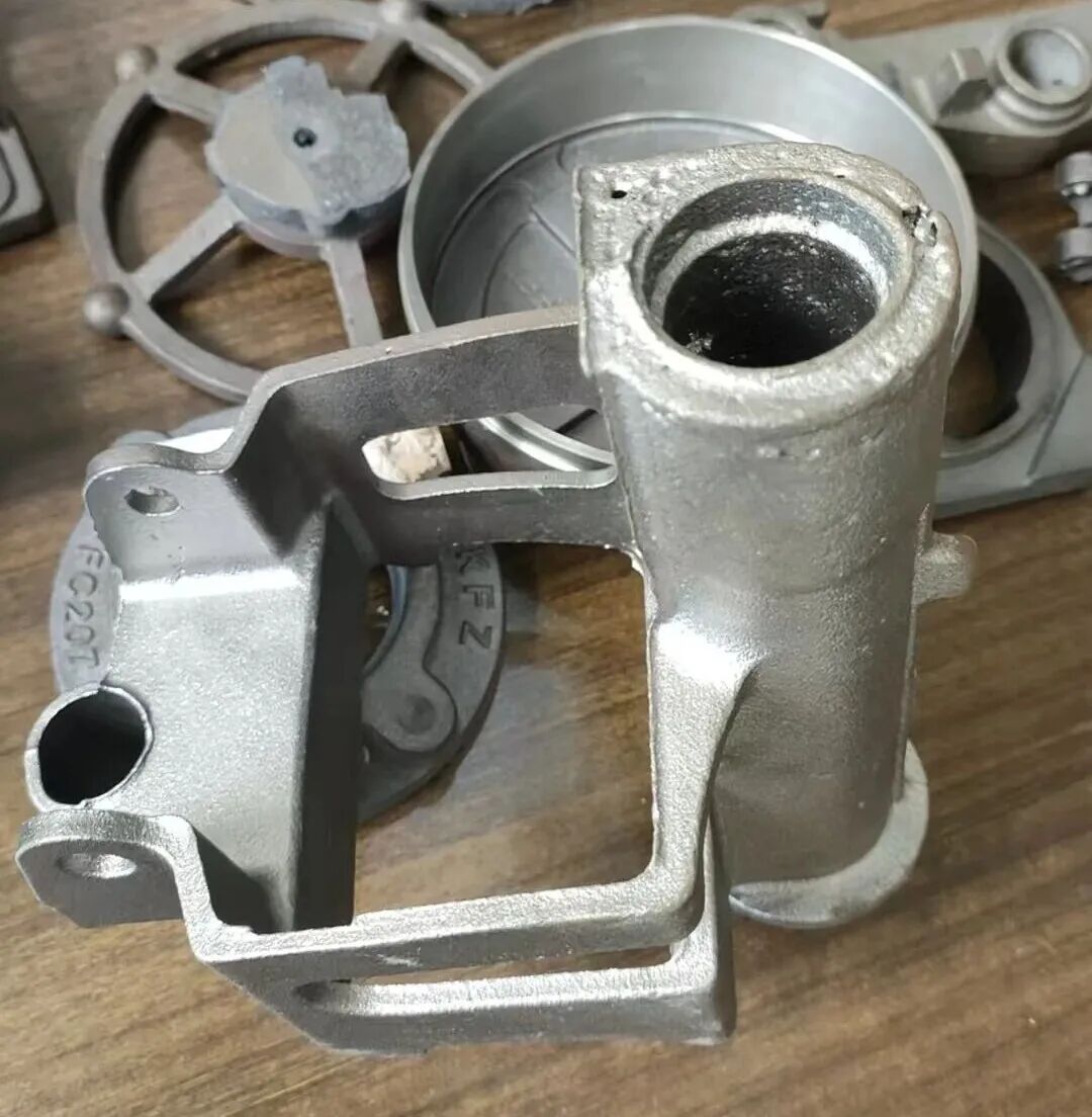 Апрацоўка моцнай сітаватасці ў цыліндрычных трубчастых пясчаных стрыжнях падчас вытворчасці дэталяў з каванага чыгуну з выкарыстаннем тэхналогіі фармавання з зялёнага пяску